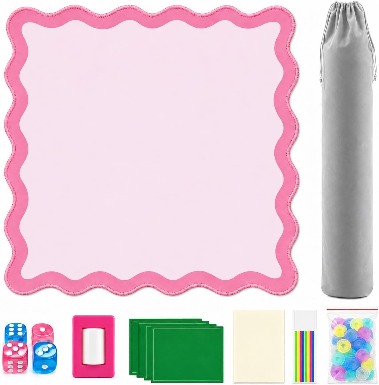 Pink scalloped mahjong mat laid flat with a gray drawstring bag, four dice, a wind marker, four rules cards, a rules guide, sticky index tabs and a bag of chips